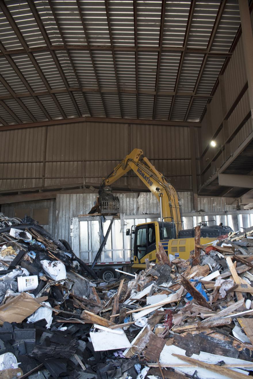 Black GHG grapple in a waste handling facility